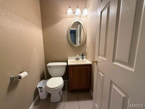 14 Shaderest Ct, Glen Carbon, IL 62034 - half bath featuring vanity and tile patterned flooring