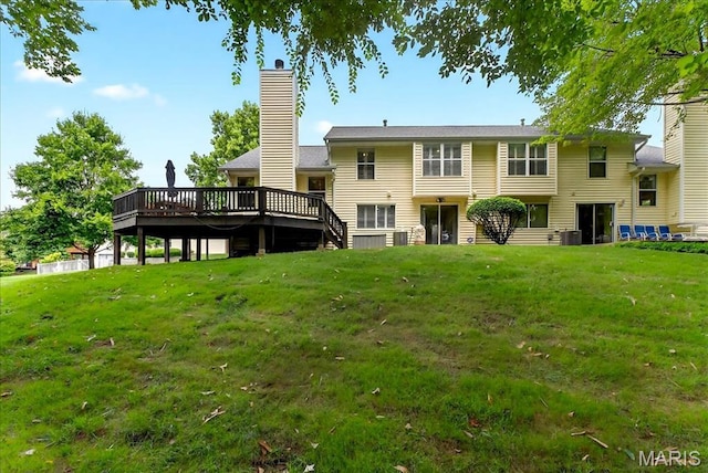 1909 King Arthur Ct, Saint Louis, MO 63146 - back of house featuring a deck and a lawn