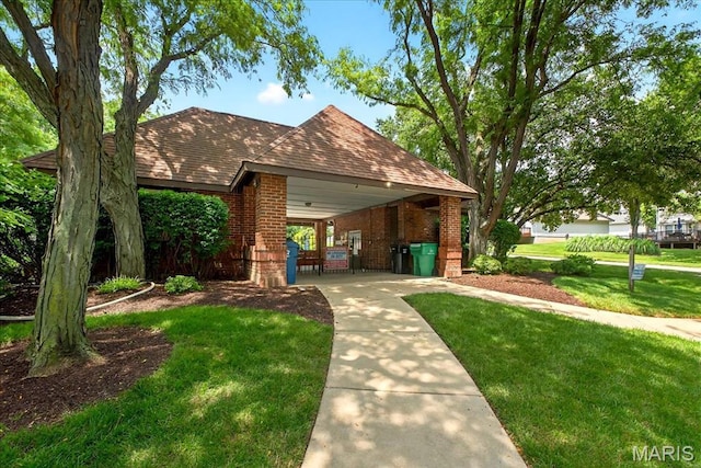 1909 King Arthur Ct, Saint Louis, MO 63146 - view of front facade featuring brick siding, a front lawn, and a shingled roof