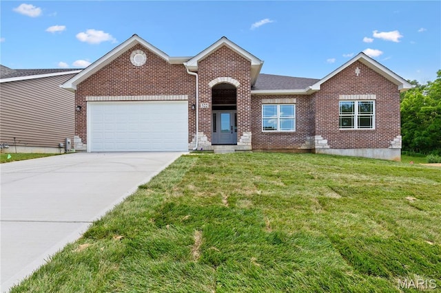 522 Dove Dr, Saint Charles, MO 63301 - view of front facade featuring brick siding, an attached garage, concrete driveway, and a front lawn