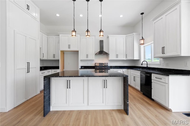 522 Dove Dr, Saint Charles, MO 63301 - kitchen with dishwasher, wall chimney exhaust hood, stainless steel electric stove, light wood finished floors, and white cabinetry
