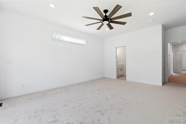 522 Dove Dr, Saint Charles, MO 63301 - spare room featuring light colored carpet, a ceiling fan, and recessed lighting