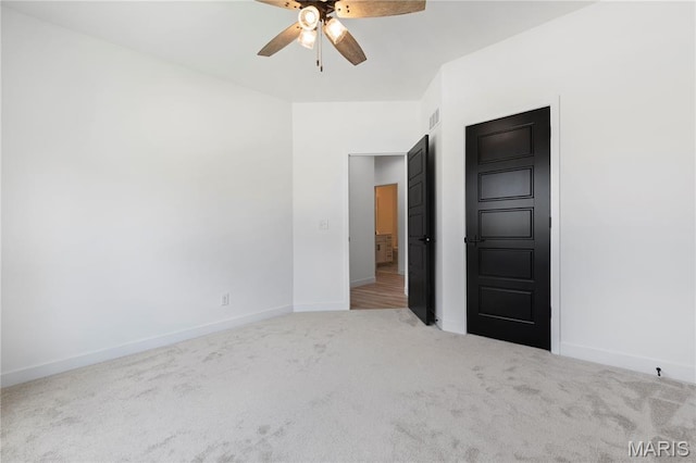 522 Dove Dr, Saint Charles, MO 63301 - unfurnished bedroom featuring carpet flooring and ceiling fan