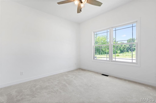 522 Dove Dr, Saint Charles, MO 63301 - carpeted empty room featuring baseboards and a ceiling fan