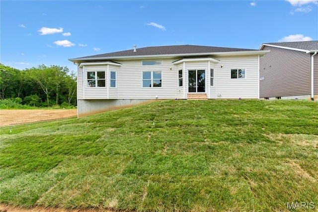 522 Dove Dr, Saint Charles, MO 63301 - rear view of house featuring entry steps and a yard