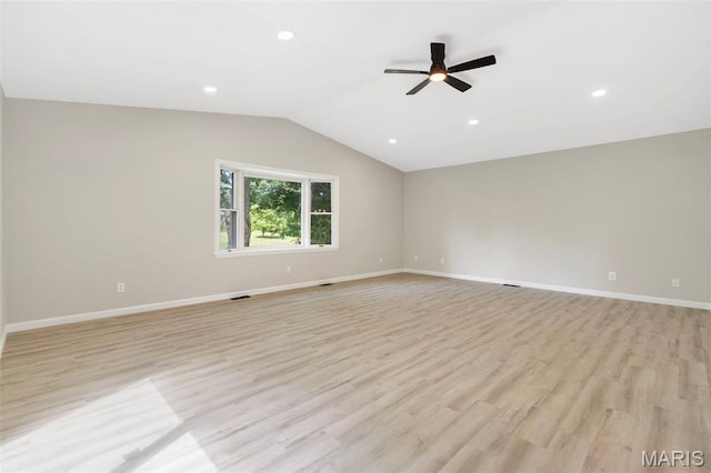 490 Lula Dr, Florissant, MO 63031 - spare room featuring a ceiling fan, light wood finished floors, vaulted ceiling, and recessed lighting