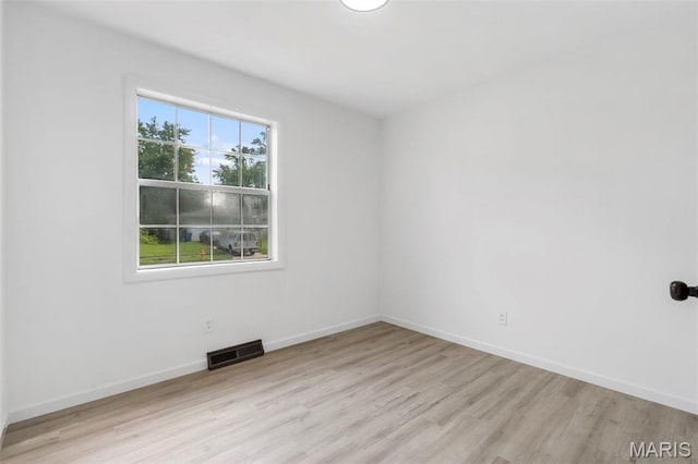 490 Lula Dr, Florissant, MO 63031 - empty room featuring light wood finished floors and baseboards
