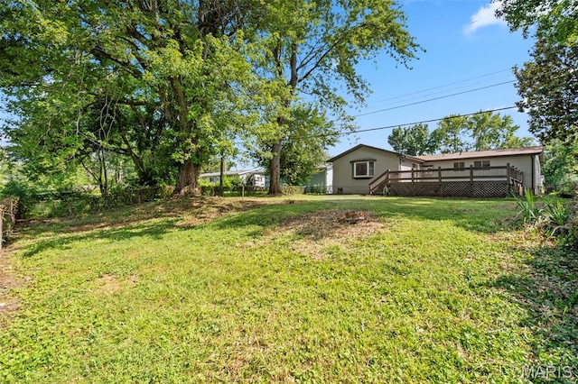 490 Lula Dr, Florissant, MO 63031 - view of green lawn featuring a deck