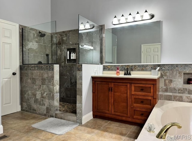 616 Remmick Stables Ct, Ofallon, MO 63368 - full bathroom with a bath, vanity, walk in shower, and tile patterned flooring