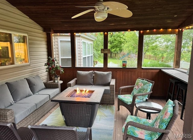 616 Remmick Stables Ct, Ofallon, MO 63368 - sunroom featuring an outdoor living space with a fire pit, vaulted ceiling, and a ceiling fan