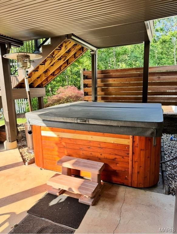 616 Remmick Stables Ct, Ofallon, MO 63368 - view of patio / terrace with a hot tub and stairway