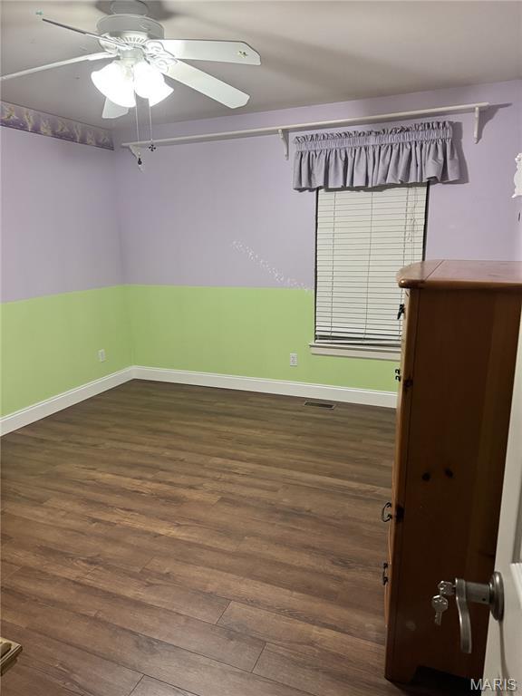 616 Remmick Stables Ct, Ofallon, MO 63368 - unfurnished room featuring wood finished floors and ceiling fan