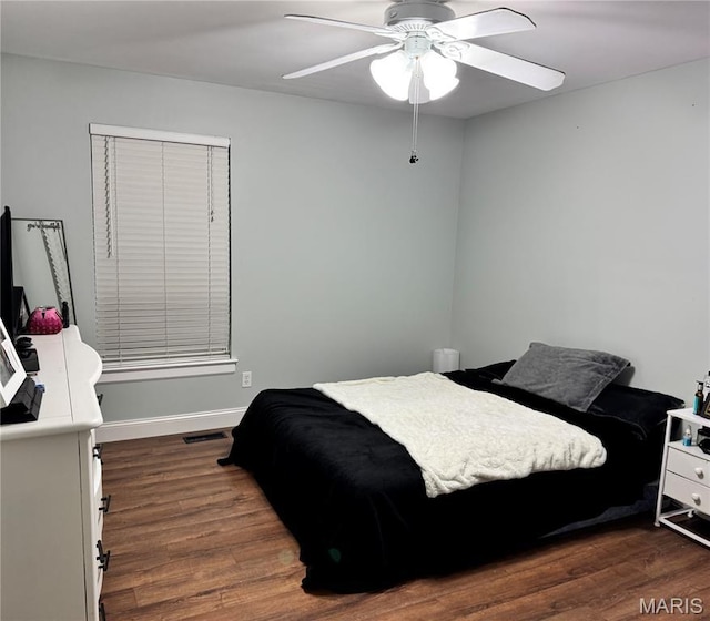 616 Remmick Stables Ct, Ofallon, MO 63368 - bedroom with dark wood-type flooring and a ceiling fan