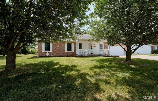 4605 Fountain Brook Dr, Waterloo, IL 62298 - view of front facade featuring a porch, a front yard, driveway, an attached garage, and brick siding