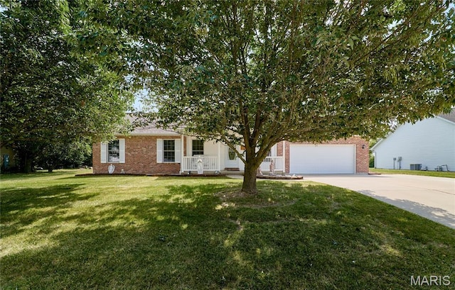 4605 Fountain Brook Dr, Waterloo, IL 62298 - view of front of property featuring brick siding, driveway, a front lawn, an attached garage, and covered porch