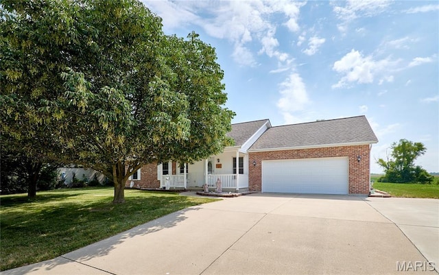 4605 Fountain Brook Dr, Waterloo, IL 62298 - view of front of home with covered porch, brick siding, concrete driveway, a front lawn, and an attached garage