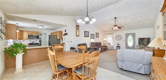4605 Fountain Brook Dr, Waterloo, IL 62298 - dining area featuring vaulted ceiling, ceiling fan, light floors, and a chandelier