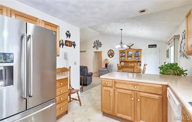 4605 Fountain Brook Dr, Waterloo, IL 62298 - kitchen with stainless steel refrigerator with ice dispenser, a peninsula, light countertops, a chandelier, and lofted ceiling