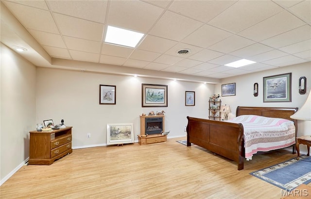 4605 Fountain Brook Dr, Waterloo, IL 62298 - bedroom featuring light wood-style floors and a paneled ceiling