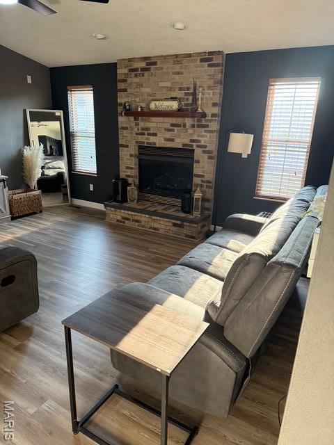 130 Regency Pl, Millstadt, IL 62260 - living room featuring wood finished floors, a fireplace, and ceiling fan