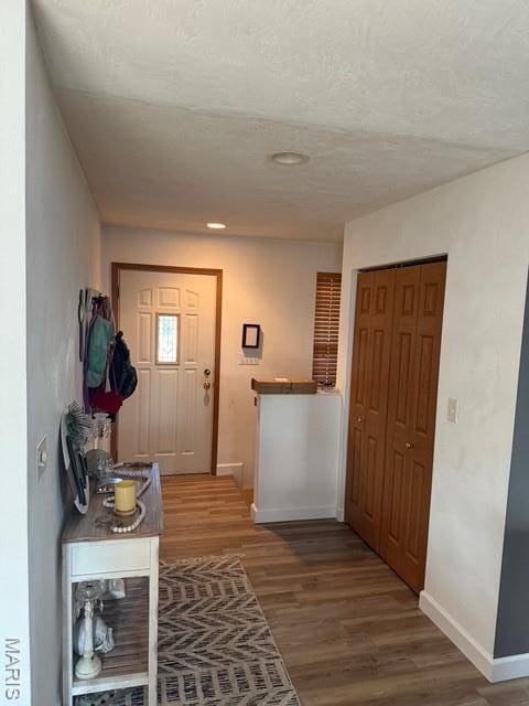 130 Regency Pl, Millstadt, IL 62260 - entryway with wood finished floors, a textured ceiling, and recessed lighting
