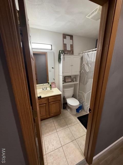 130 Regency Pl, Millstadt, IL 62260 - bathroom with vanity, tile patterned floors, and a shower with curtain