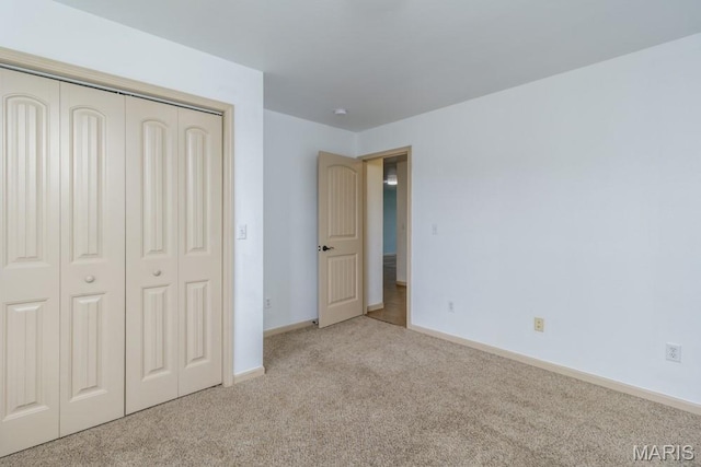 100 Edna St Unit B, Waynesville, MO 65583 - unfurnished bedroom featuring carpet floors and a closet
