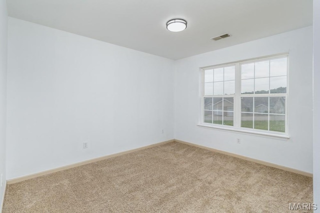 100 Edna St Unit B, Waynesville, MO 65583 - carpeted spare room with baseboards