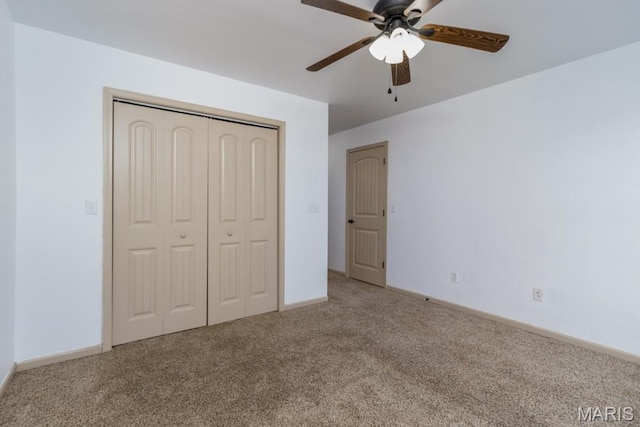 100 Edna St Unit B, Waynesville, MO 65583 - unfurnished bedroom with carpet, a closet, and a ceiling fan