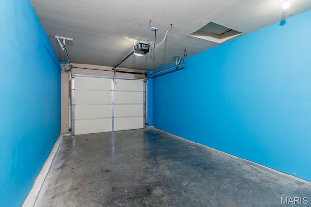 100 Edna St Unit B, Waynesville, MO 65583 - garage with a garage door opener
