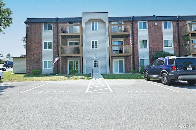 2745 Westphalia Ct Unit F, Oakville, MO 63129 - view of property featuring uncovered parking
