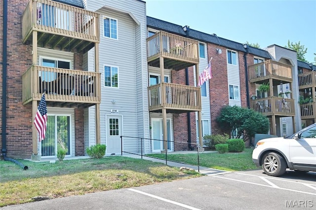 2745 Westphalia Ct Unit F, Oakville, MO 63129 - view of building exterior featuring uncovered parking