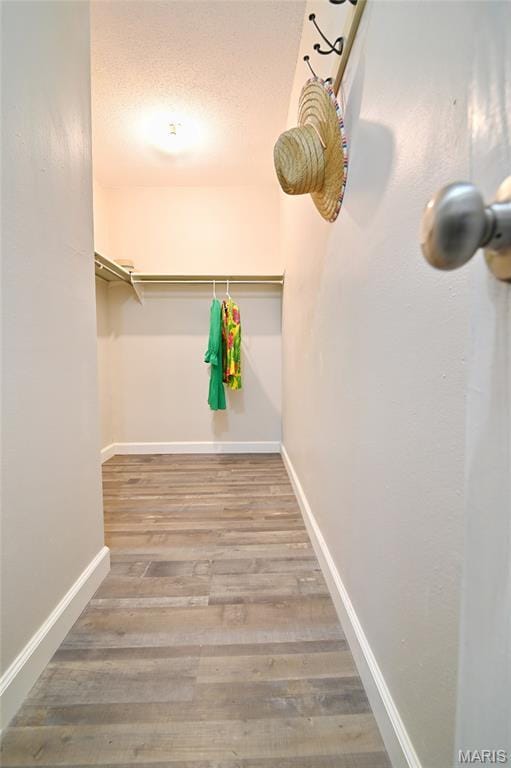 2745 Westphalia Ct Unit F, Oakville, MO 63129 - spacious closet with wood finished floors