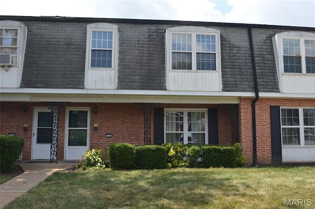 1726 Mayenne Ct, Saint Louis, MO 63125 - multi unit property featuring mansard roof, brick siding, and a front yard