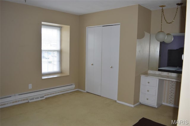 1726 Mayenne Ct, Saint Louis, MO 63125 - unfurnished bedroom with a baseboard heating unit, light colored carpet, and a closet