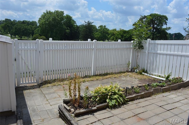 1726 Mayenne Ct, Saint Louis, MO 63125 - view of patio / terrace featuring a gate