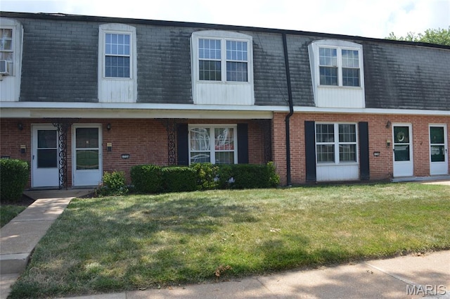 1726 Mayenne Ct, Saint Louis, MO 63125 - multi unit property featuring mansard roof, brick siding, a front lawn, and a shingled roof