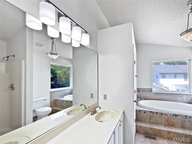4033 Treeshadow Dr, Saint Peters, MO 63376 - full bathroom with vanity, a bath, a shower, and a textured ceiling
