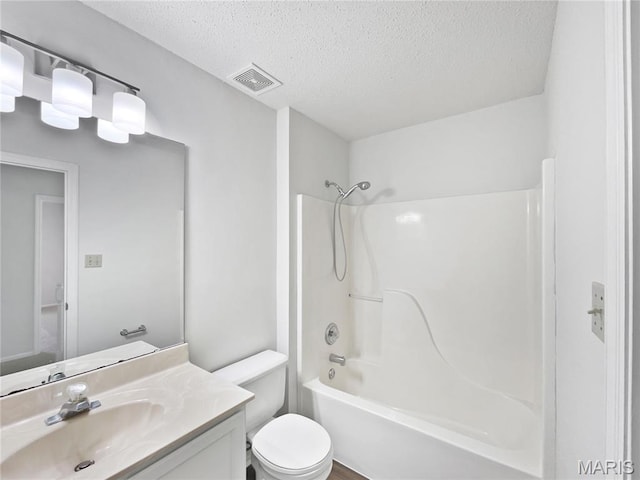 4033 Treeshadow Dr, Saint Peters, MO 63376 - full bathroom with vanity, a textured ceiling, and bathing tub / shower combination