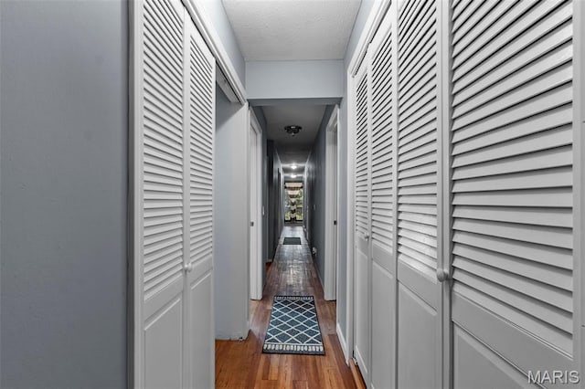 5748 State Highway 25, Cape Girardeau, MO 63701 - corridor featuring wood finished floors and a textured ceiling