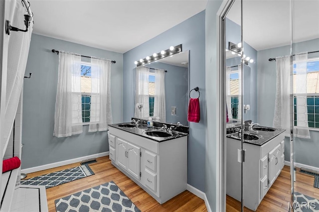 5748 State Highway 25, Cape Girardeau, MO 63701 - full bath featuring wood finished floors and vanity
