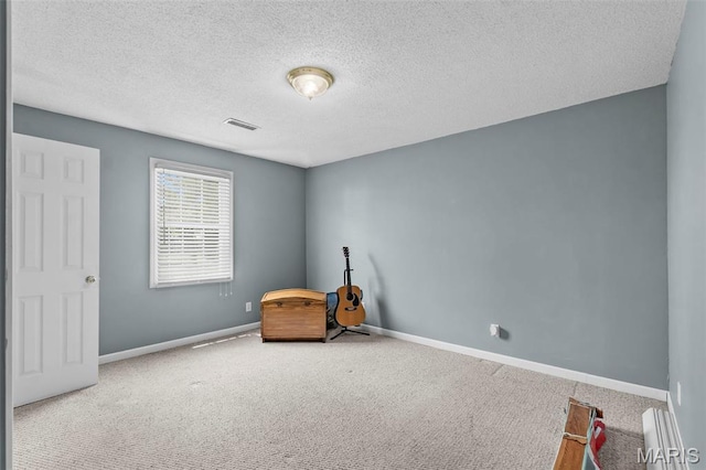 5748 State Highway 25, Cape Girardeau, MO 63701 - unfurnished room with carpet flooring and a textured ceiling