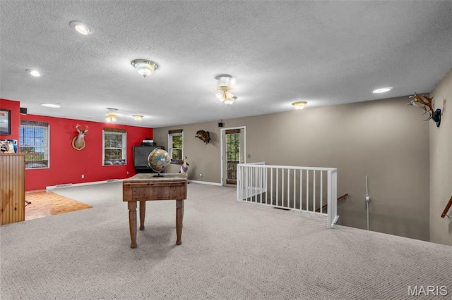 5748 State Highway 25, Cape Girardeau, MO 63701 - playroom with carpet floors and a textured ceiling