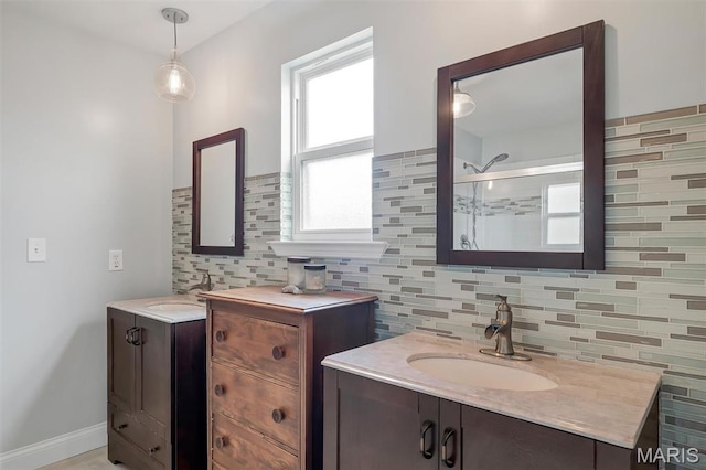 1209 Riesling Ln, Pevely, MO 63070 - bathroom featuring backsplash, two vanities, and a stall shower