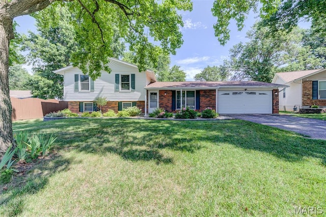 6 Barkwood Ct, Saint Peters, MO 63376 - split level home with driveway, an attached garage, and brick siding