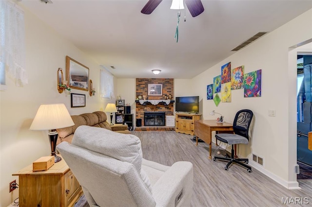 6 Barkwood Ct, Saint Peters, MO 63376 - living area featuring light wood-style flooring, a fireplace, and ceiling fan
