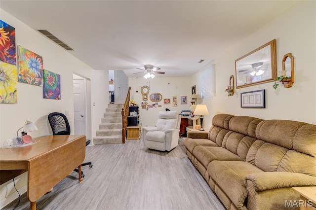 6 Barkwood Ct, Saint Peters, MO 63376 - living room with stairway, a ceiling fan, and wood finished floors