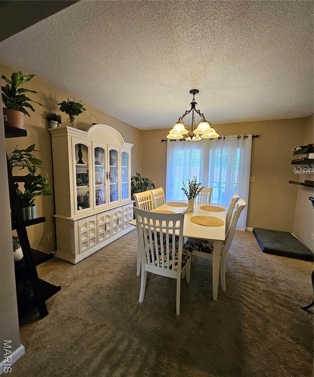 22 Settlers Trl, Hannibal, MO 63401 - dining room with a chandelier, carpet floors, and a textured ceiling