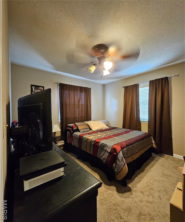 22 Settlers Trl, Hannibal, MO 63401 - carpeted bedroom with a ceiling fan, a textured ceiling, and a wood stove