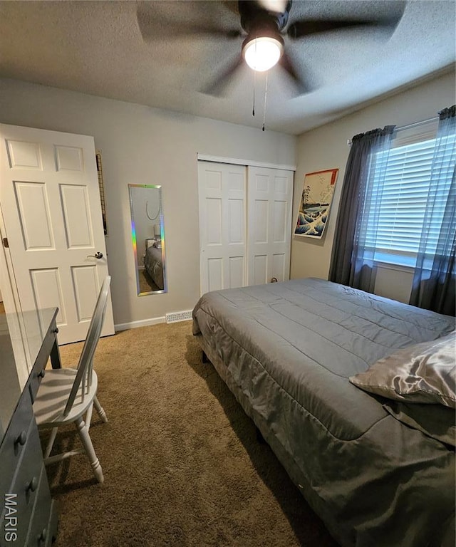 22 Settlers Trl, Hannibal, MO 63401 - bedroom featuring carpet floors, a closet, a textured ceiling, and ceiling fan